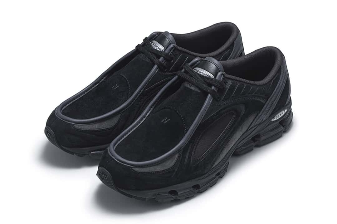 Par negro de la COMME des GARÇONS HOMME x New Balance 1890A, en gamuza y cuero negros con la suela gris oscuro