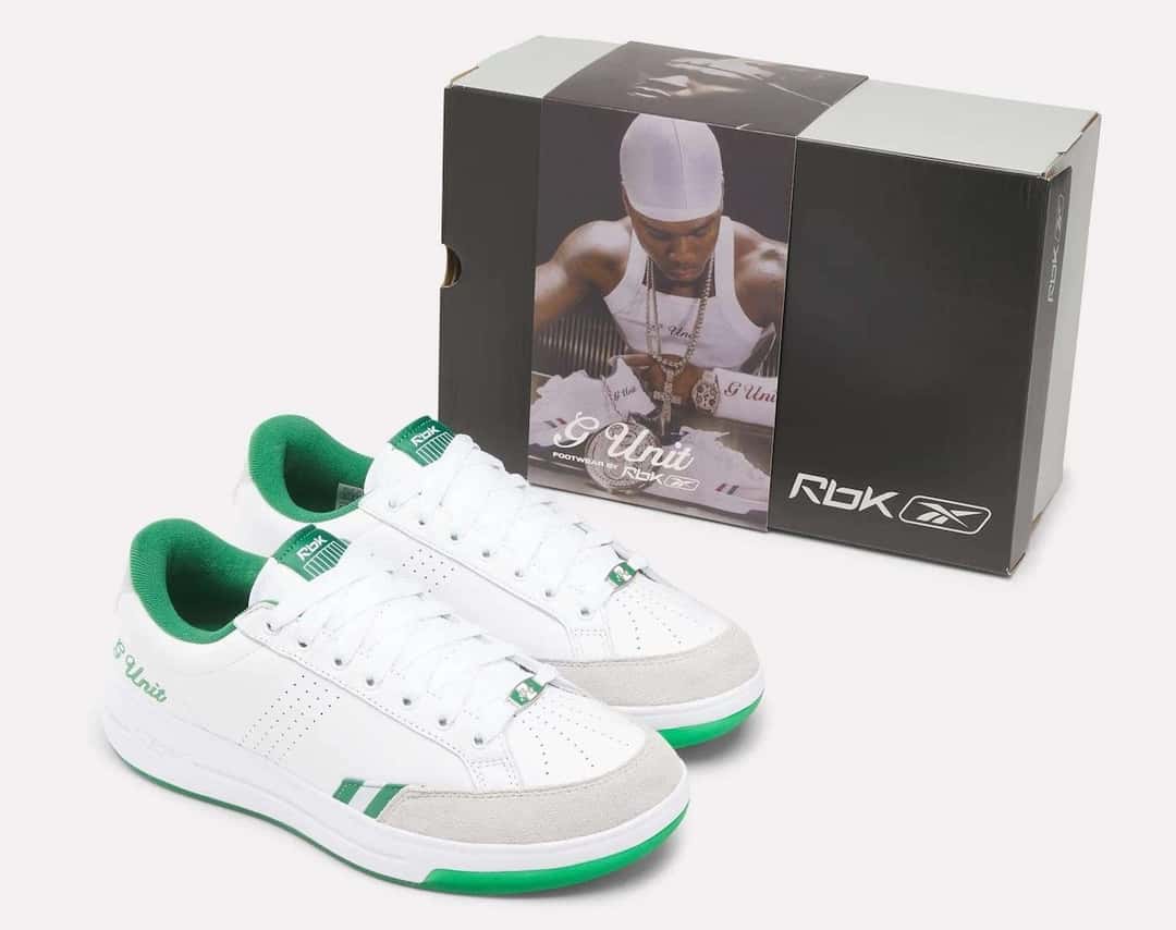 Reebok G-Unit G6 White/Green junto a la caja negra con la foto de 50 Cent y el logo de Reebok