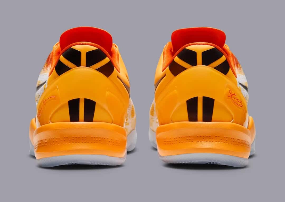 Talones de la Nike Kobe 8 Protro Shanghai Fireworks en naranja, con detalles gráficos negros