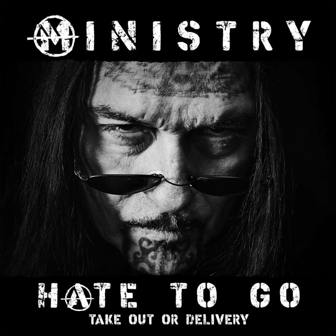 Portada de «Hate to Go (Take Out or Delivery)», de Ministry: un retrato en blanco y negro de un hombre de pelo largo con anteojos oscuros, con el logo de la banda arriba y el título abajo