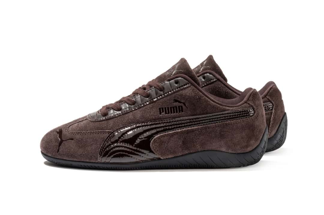 PUMA Speedcat Croc marrón oscuro de perfil sobre fondo blanco, con upper de gamuza, la Formstrip y la zona de los ojales en cuero brillante con textura de cocodrilo y suela marrón